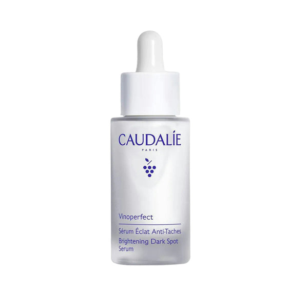 Caudalie skincare serum bottle on a light gray background