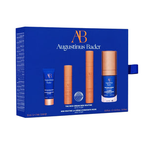 Augustinus Bader skincare product set with blue packaging on a white background