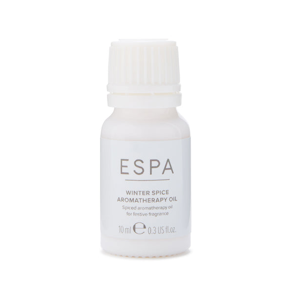 ESPA Winter Spice aromatherapy oil bottle on a white background