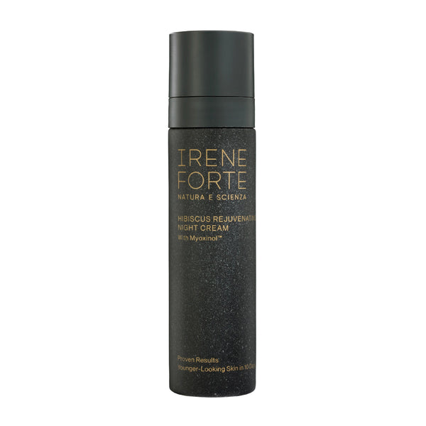 Black skincare bottle with gold text on a white background