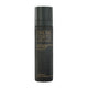 Black skincare bottle with gold text on a white background