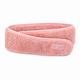 A pink textured terry cloth hair wrap headband with a small rectangular brand label reading 'MZ SKIN' on a clean white background.