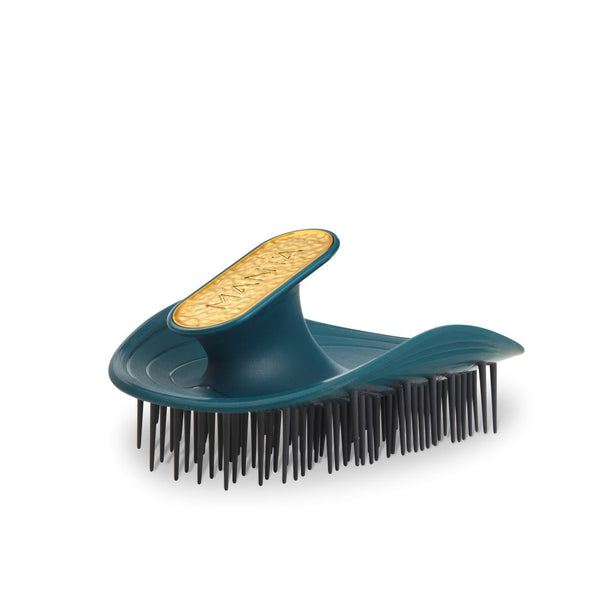 Pet grooming brush with a green handle and black bristles on a white background