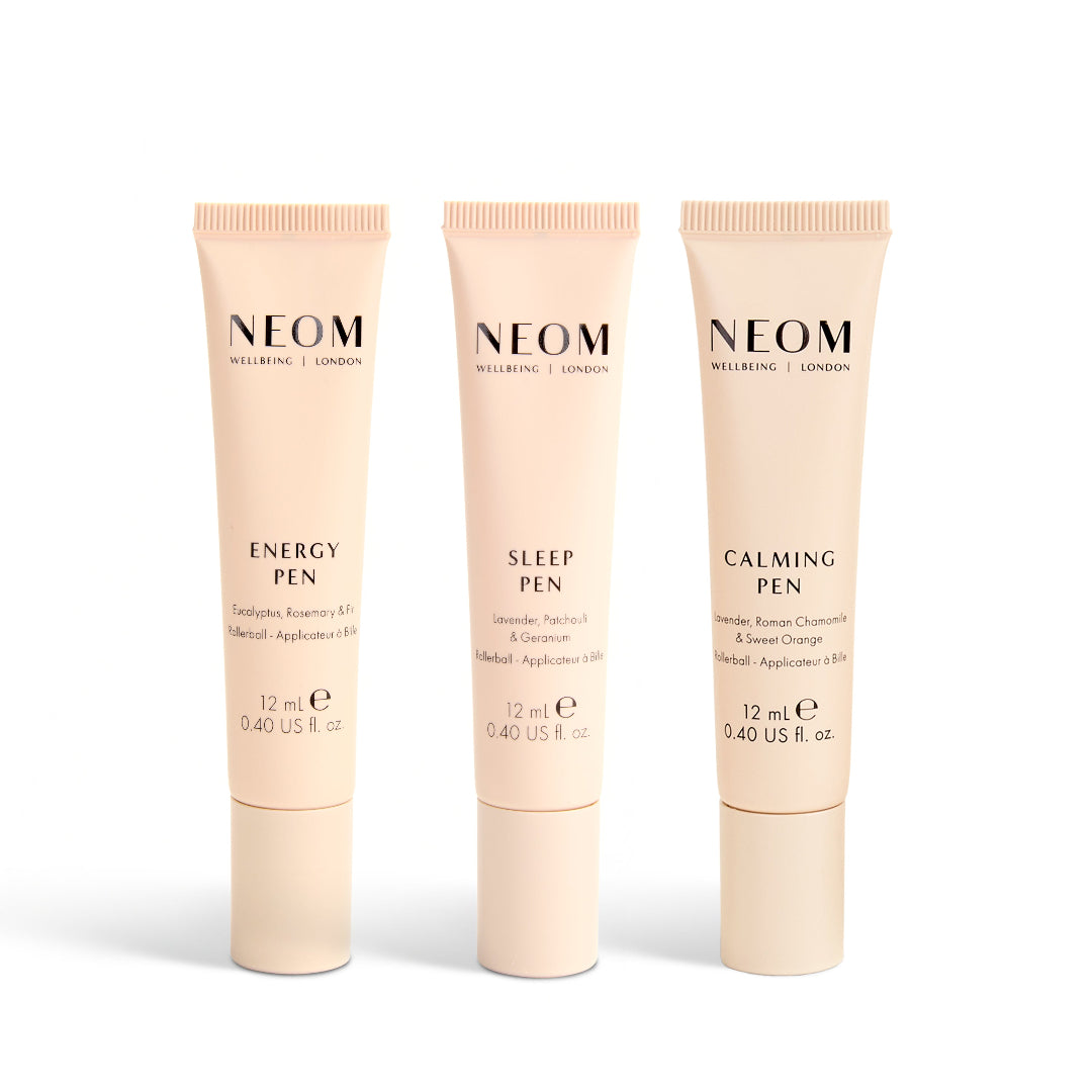 Three NEOM skincare products on a white background