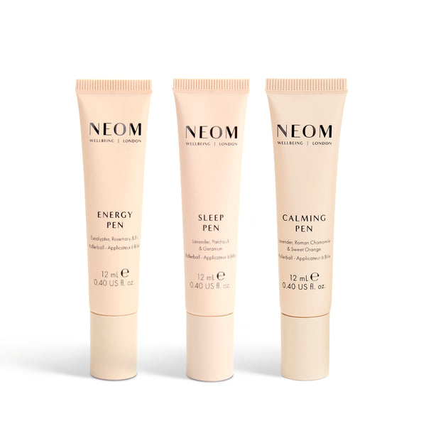 Three NEOM skincare products on a white background