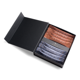 An open black gift box containing several small rectangular packets or sachets labeled ANCIENT BRAVE, arranged in two rows on a clean white background.
