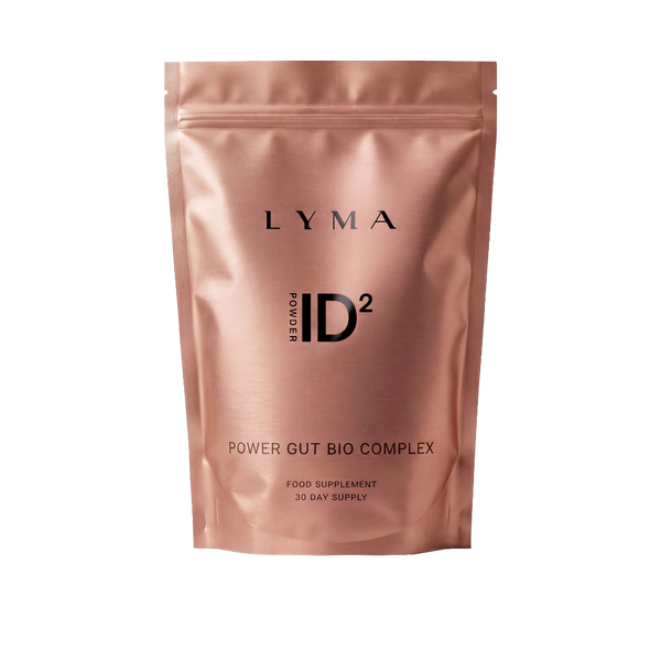 A metallic rose gold stand-up pouch of Lyma ID2 Power Gut Bio Complex food supplement, shown on a plain white background.