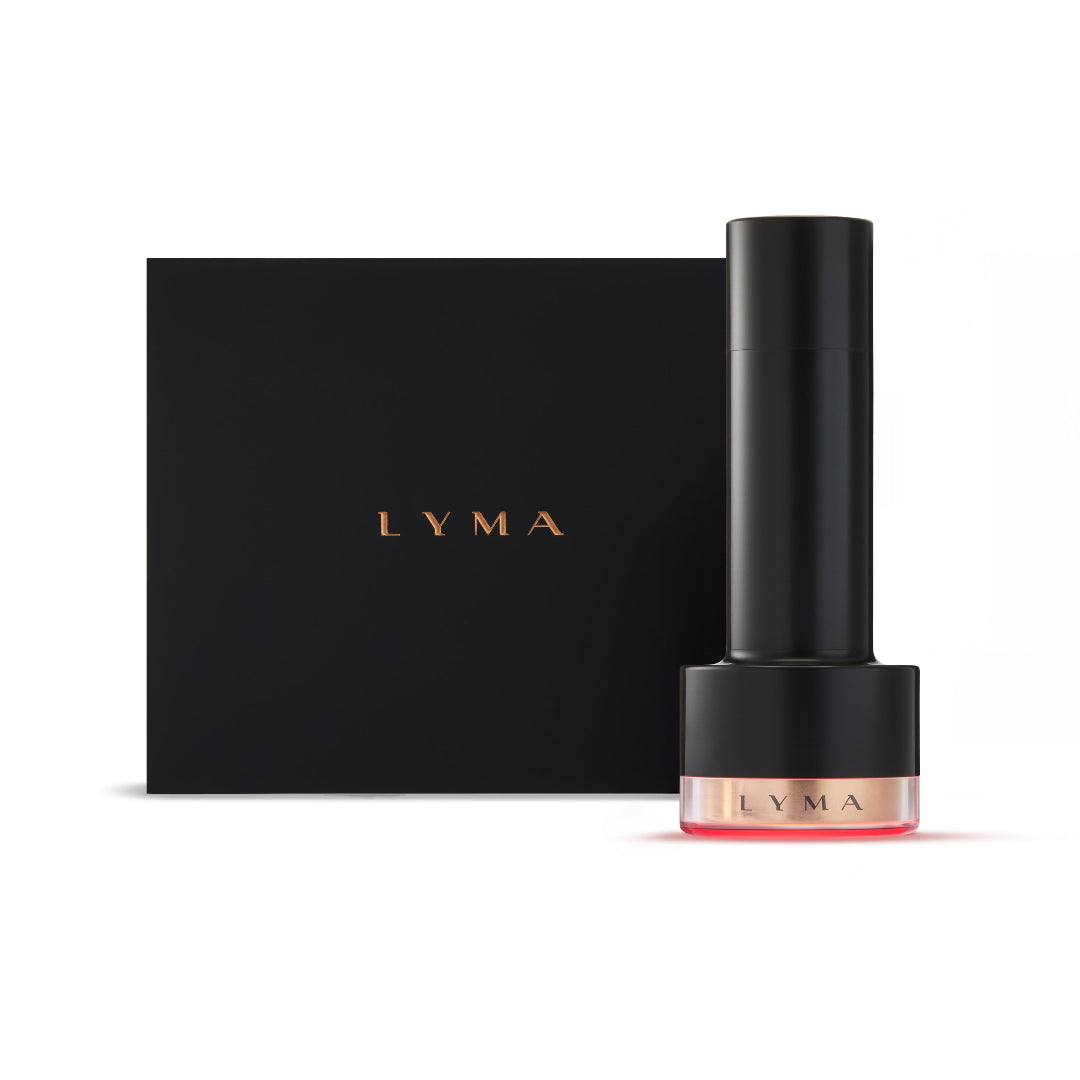 A black cylindrical cosmetic tube with a metallic rose gold base and the brand name 'LYMA' in gold, displayed next to its matching black packaging box on a clean white background.