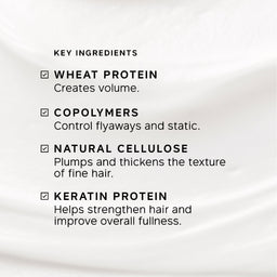 A close-up of a white or very light beige fabric background with black text listing key ingredients: wheat protein, copolymers, natural cellulose, and keratin protein, each with a checkmark.