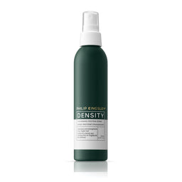 Green spray bottle with white cap labeled 'Philip Kingsley Density' on a white background
