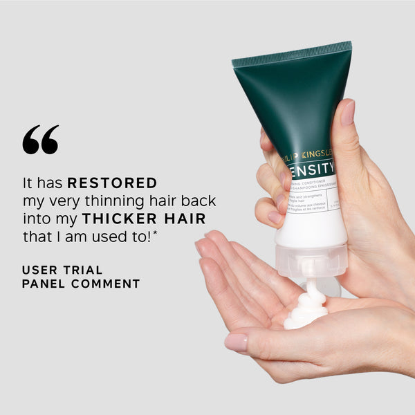 Hand holding a tube of King's Lab Intensity hair care product with a user trial panel comment on a light gray background.