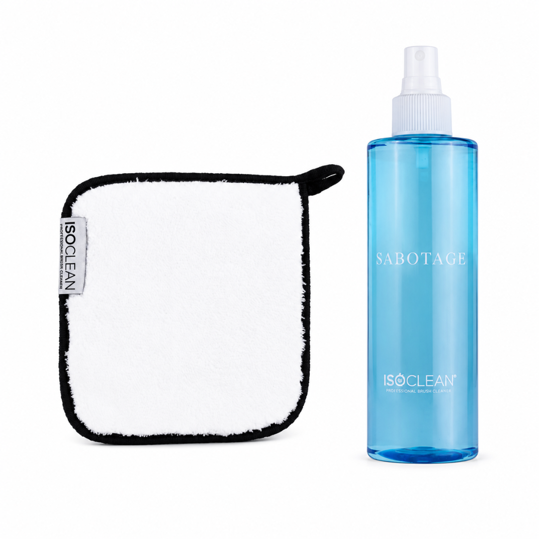 ISOCLEAN cleaning kit featuring a white microfiber cloth with a black border and a translucent blue spray bottle labeled SABOTAGE.