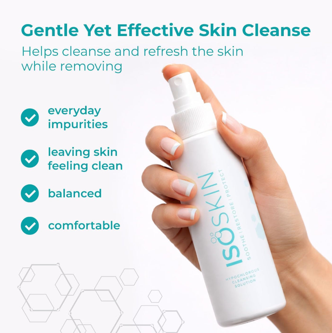 Hand holding a white bottle of ISOSKI skin cleanse with text highlighting its benefits on a light background.