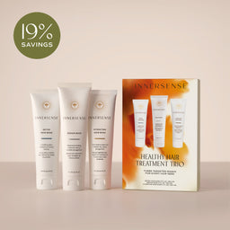 InnerSense Healthy Hair Treatment Trio set including three white hair care tubes and their matching gift box, displayed on a light beige background with a green '19% SAVINGS' badge in the top left corner.