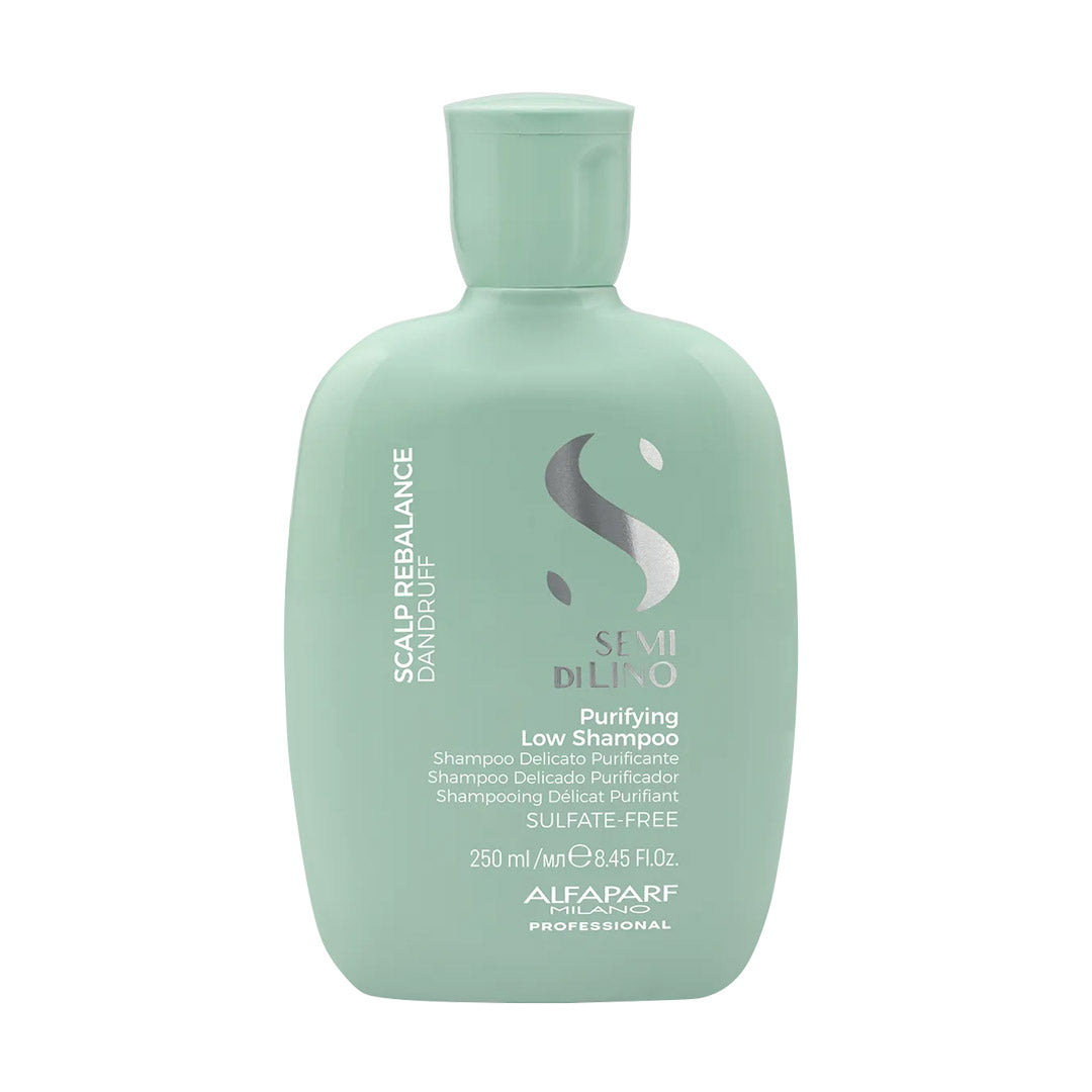 Green shampoo bottle with brand logo on a white background