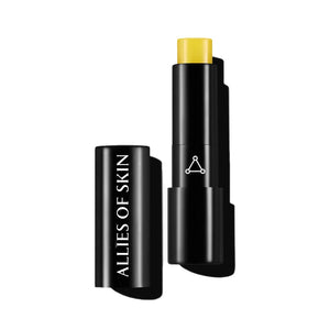Allies of Skin Peptide & Ceramide Repair Lip Balm with lid to the left