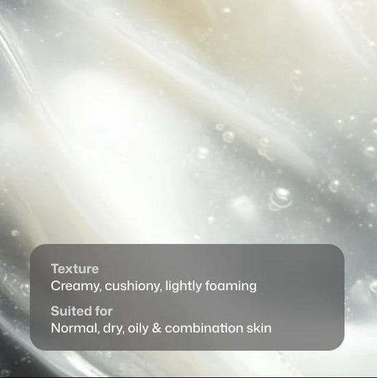 Textured cream with a gray label describing its properties and skin types.