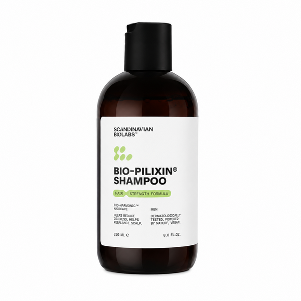 A 250 ml bottle of Scandinavian Bolabs Bio-Pilixin Shampoo for men, featuring a dark amber brown bottle, a black cap, and a white label with green accents, set against a plain white background.