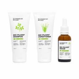 Three scalp care products from Scandinavian Bioblasts on a white background: Bio-Pilixin Shampoo, Bio-Pilixin Conditioner, and Bio-Pilixin Serum. The shampoo and conditioner are in white squeeze tubes with green leaf graphics, and the serum is in a small amber glass bottle with a white dropper cap.