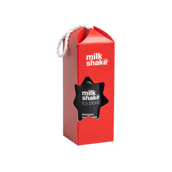 A red Milk Shake Icy Blond shampoo box with a white hanging loop and a black star-shaped label on the front, shown on a plain white background.
