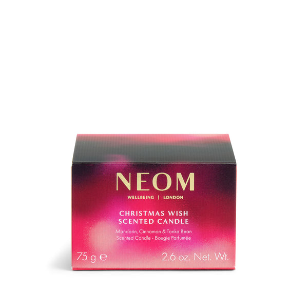 NEOM Christmas Wish scented candle packaging on a white background
