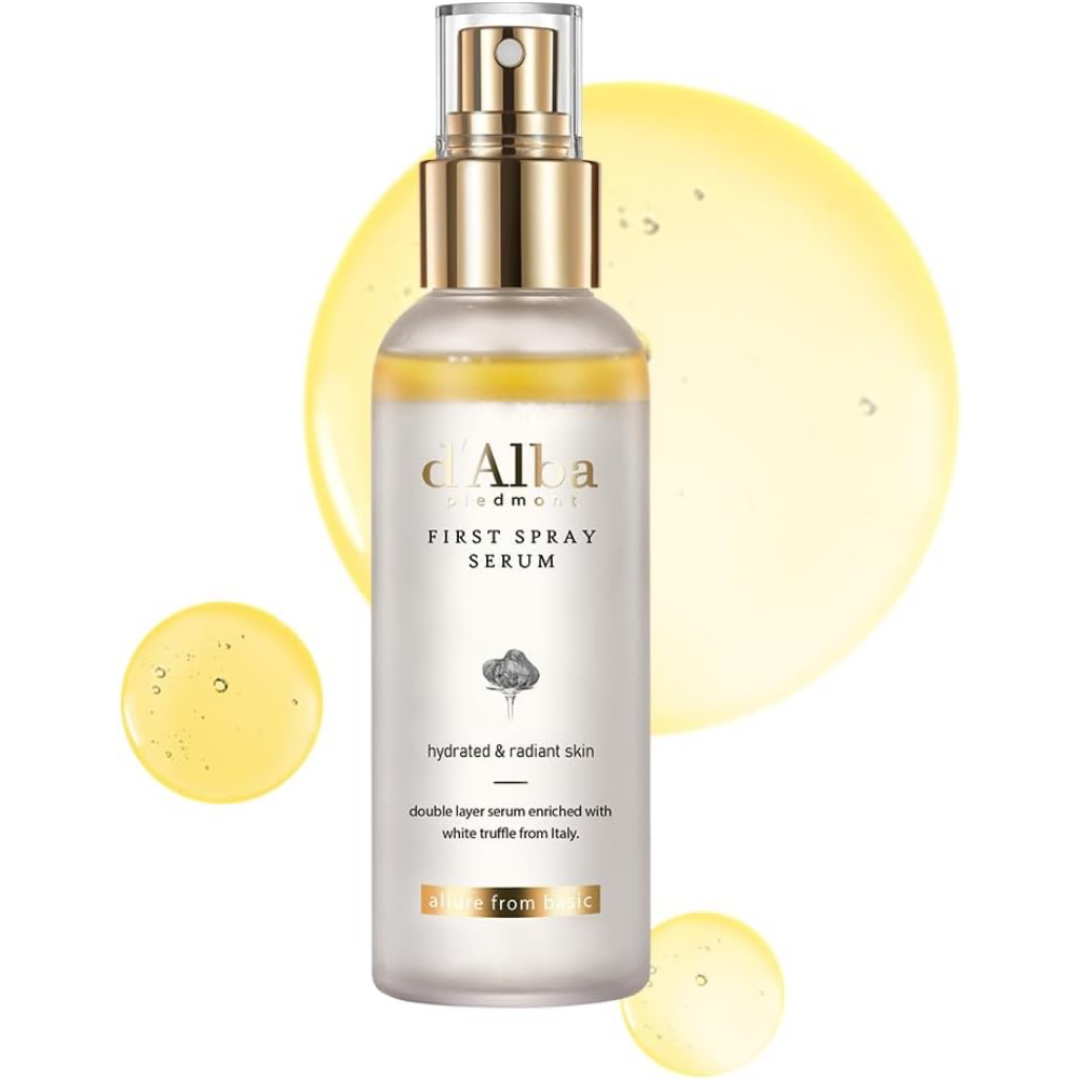 Alba Botanica First Spray Serum bottle with yellow droplets on a white background