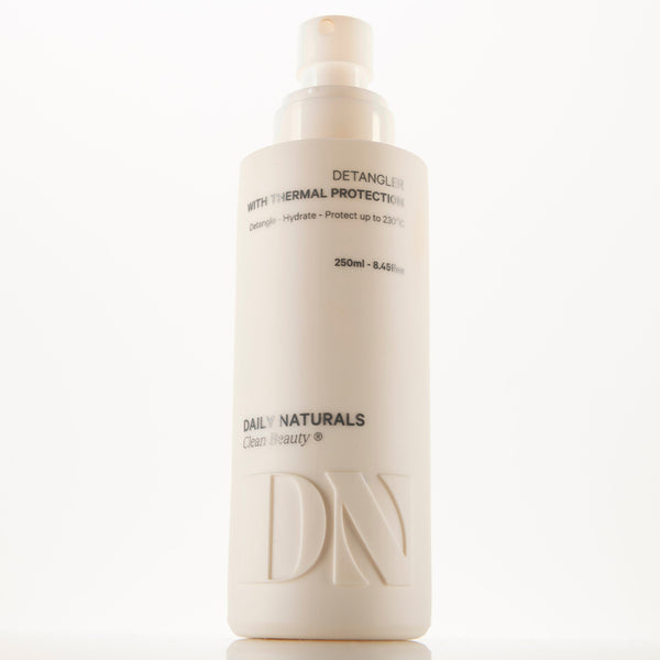 Hair care product bottle with 'Daily Naturals' branding on a white background