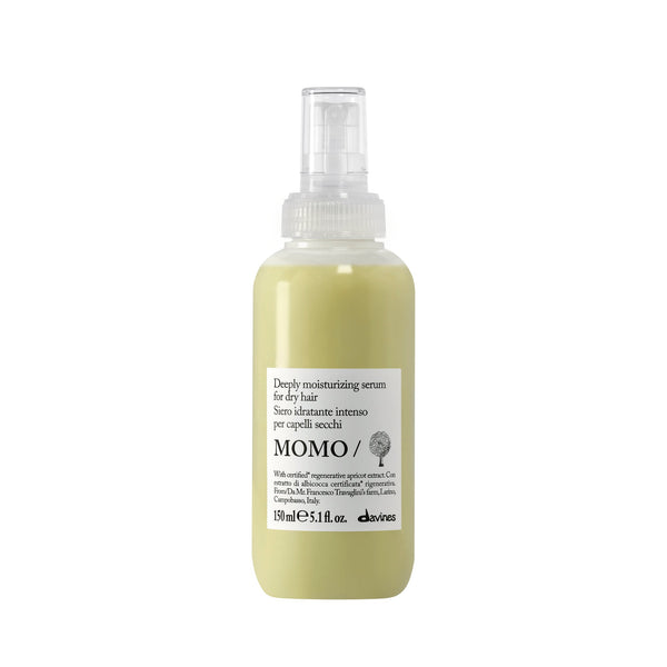 Hair serum bottle with label on a white background
