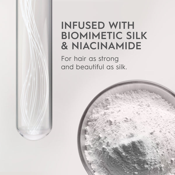 Product packaging with text about biomimetic silk and niacinamide, close-up of powder.