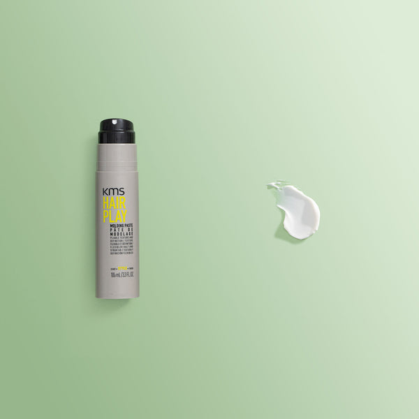 KMS Hair Play product on a green background