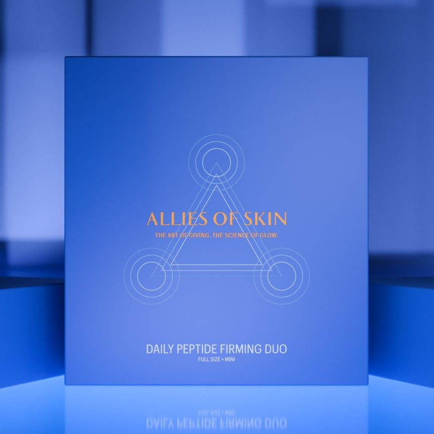 Blue packaging of 'Allies of Skin' Daily Peptide Firming Duo on a blue background