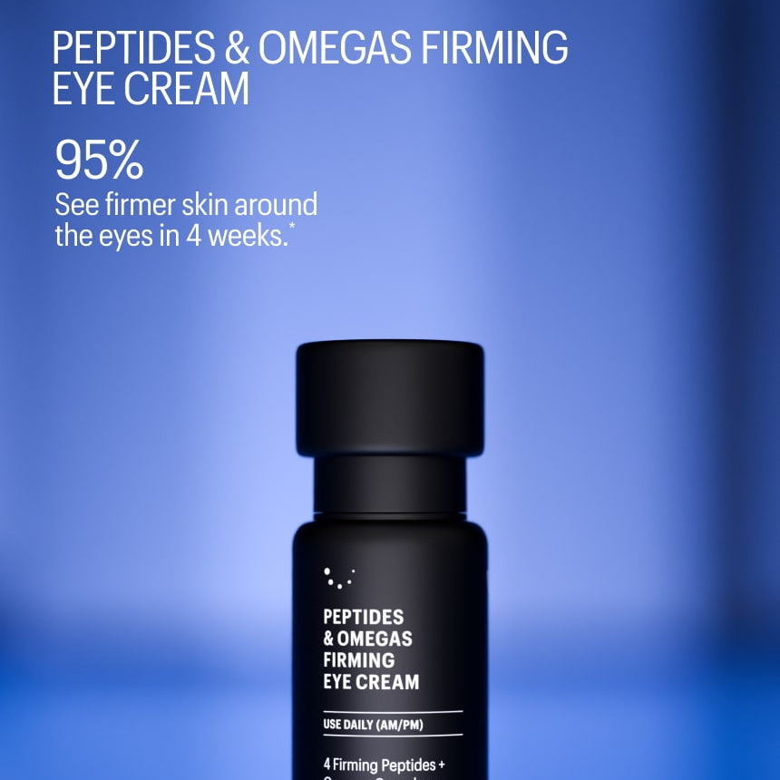 Black eye cream bottle with text on a blue background