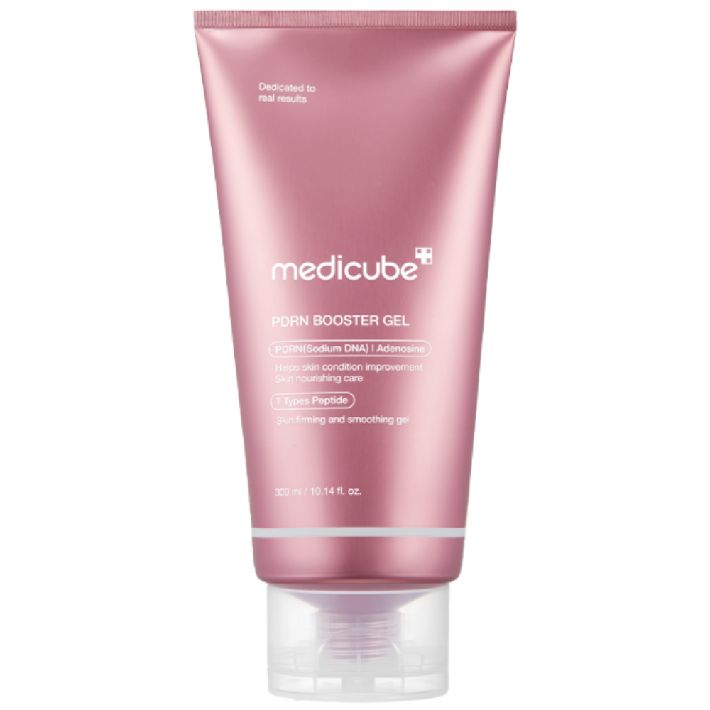 Pink tube of Medicube hair product on a white background