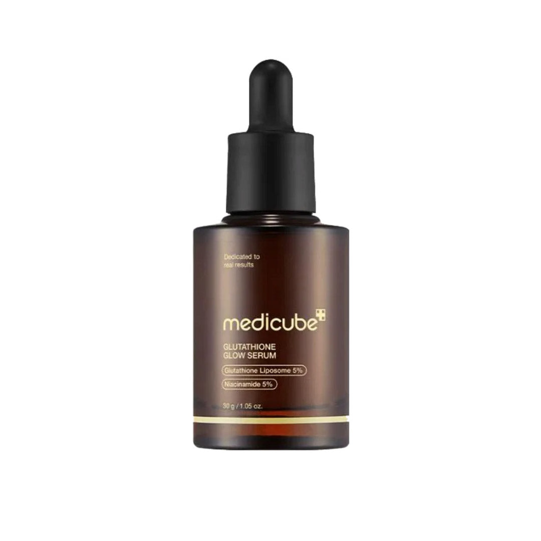 A brown glass bottle with a dropper containing the Medicube Glutathione Glow Serum, labeled for brightening and wrinkle-improving effects.