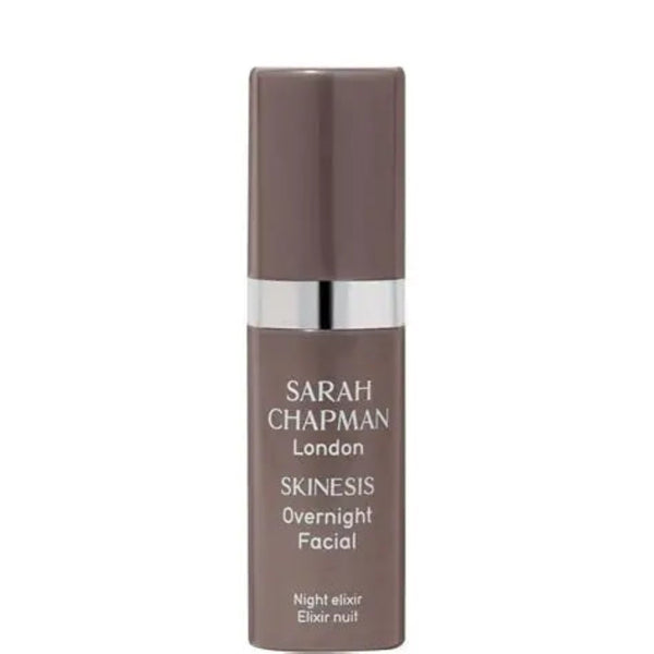 Sarah Chapman London Skinesis Overnight Facial Night Elixir in a brown bottle with a silver metallic band and white text, set against a plain white background.