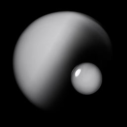 Two celestial bodies, one larger than the other, on a black background