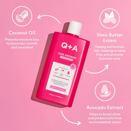 Q+A Curl Defining Shampoo bottle with ingredients on a pink background