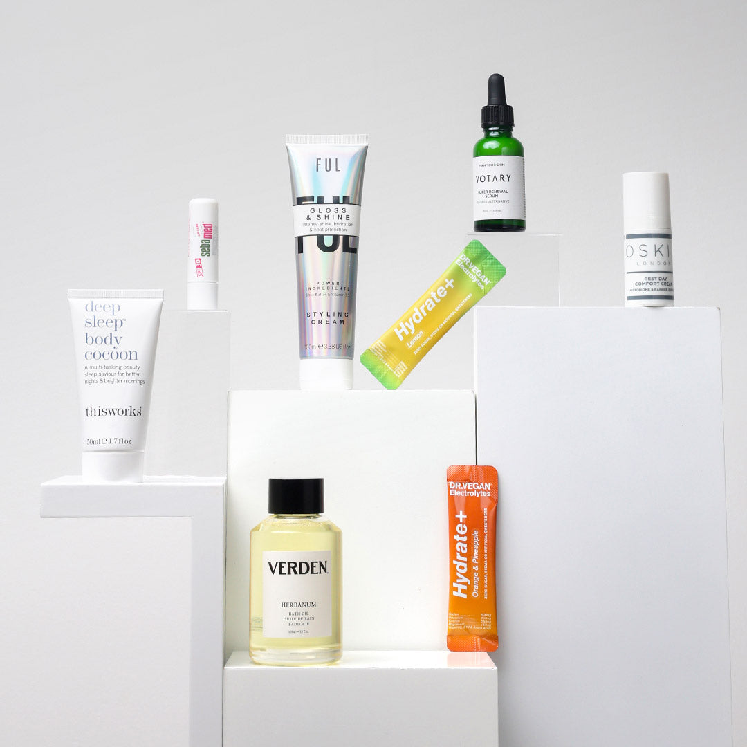 Collection of skincare and wellness products on a white background