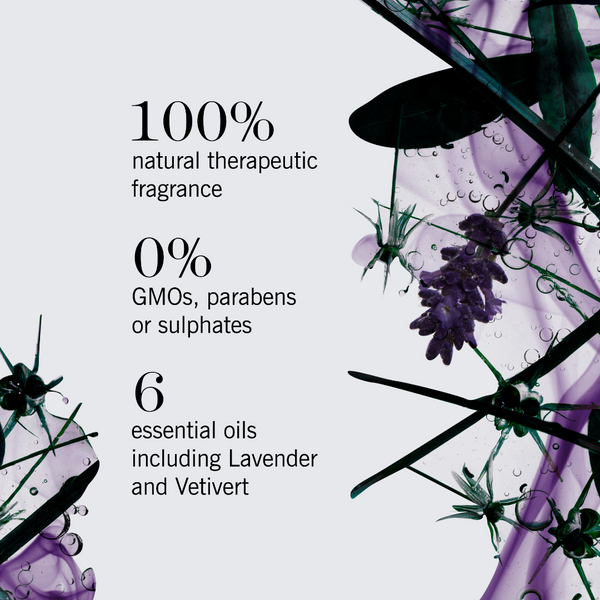 Promotional graphic for a fragrance with text reading '100% natural therapeutic fragrance', '0% GMOs, parabens or sulphates', and '6 essential oils including Lavender and Vetivert', set against a white background with purple botanical and spider illustrations.