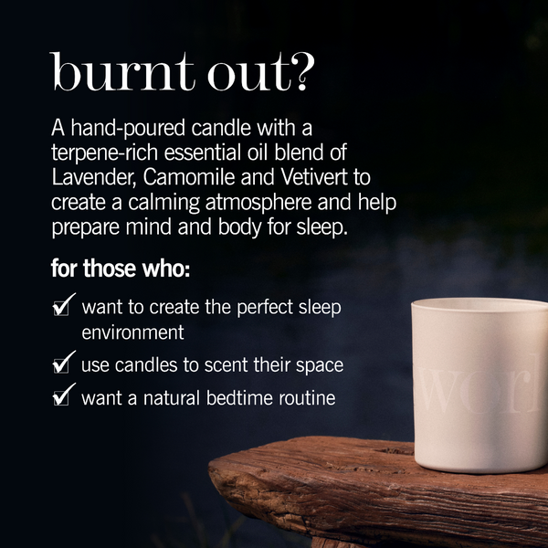 A white ceramic candle jar sits on a rustic wooden surface against a dark, atmospheric background. White text on the image reads 'burnt out?' and describes a hand-poured candle with lavender, camomile, and vetiver essential oils for a calming sleep atmosphere.