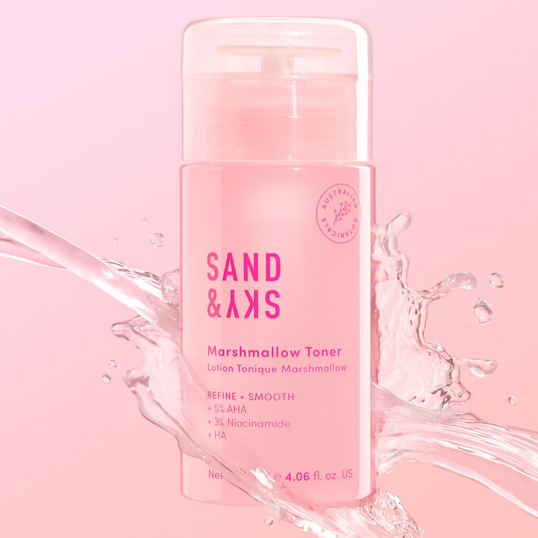 Sand & Sky Marshmallow Toner bottle splashed against water