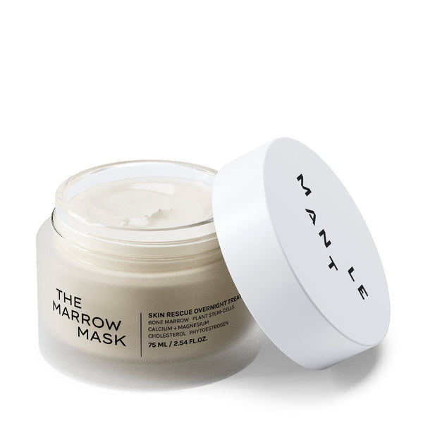 A jar of MANTLE The Marrow Mask skin rescue overnight treatment with its white lid leaning against it, set against a clean white background.
