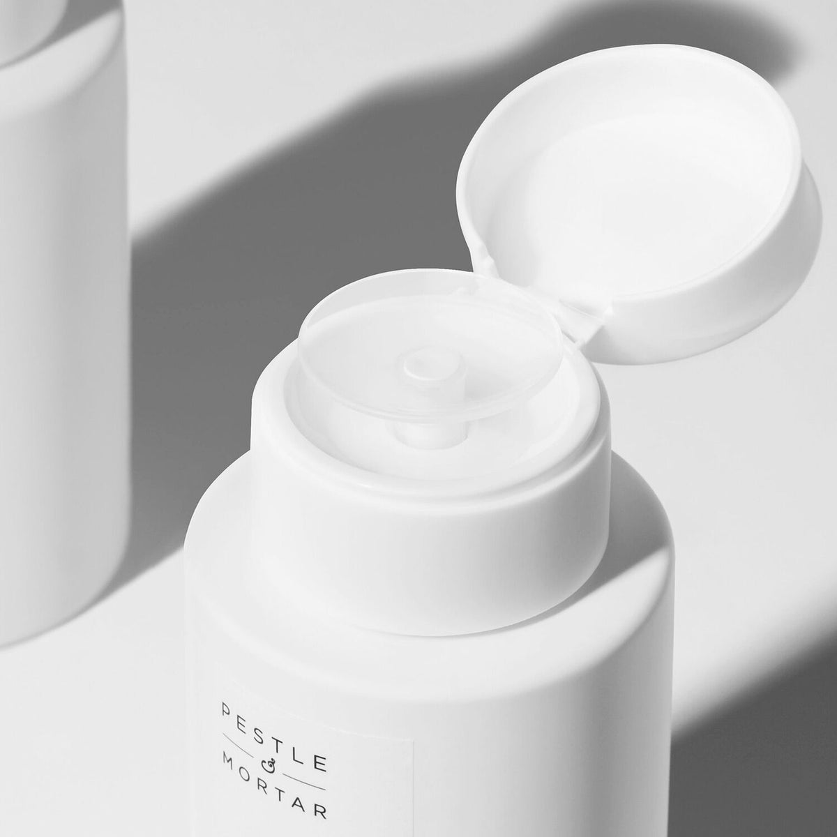 an open top of Pestle and Mortar NMF Lactic Acid Natural Moisturising Factor Solution