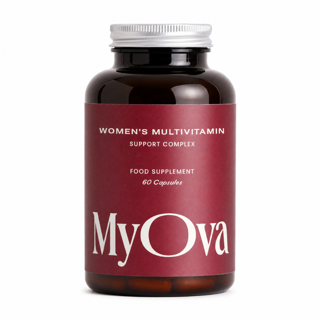 A dark amber bottle of MyOva Women's Multivitamin Support Complex with a deep red label and a silver cap, shown on a clean white background.