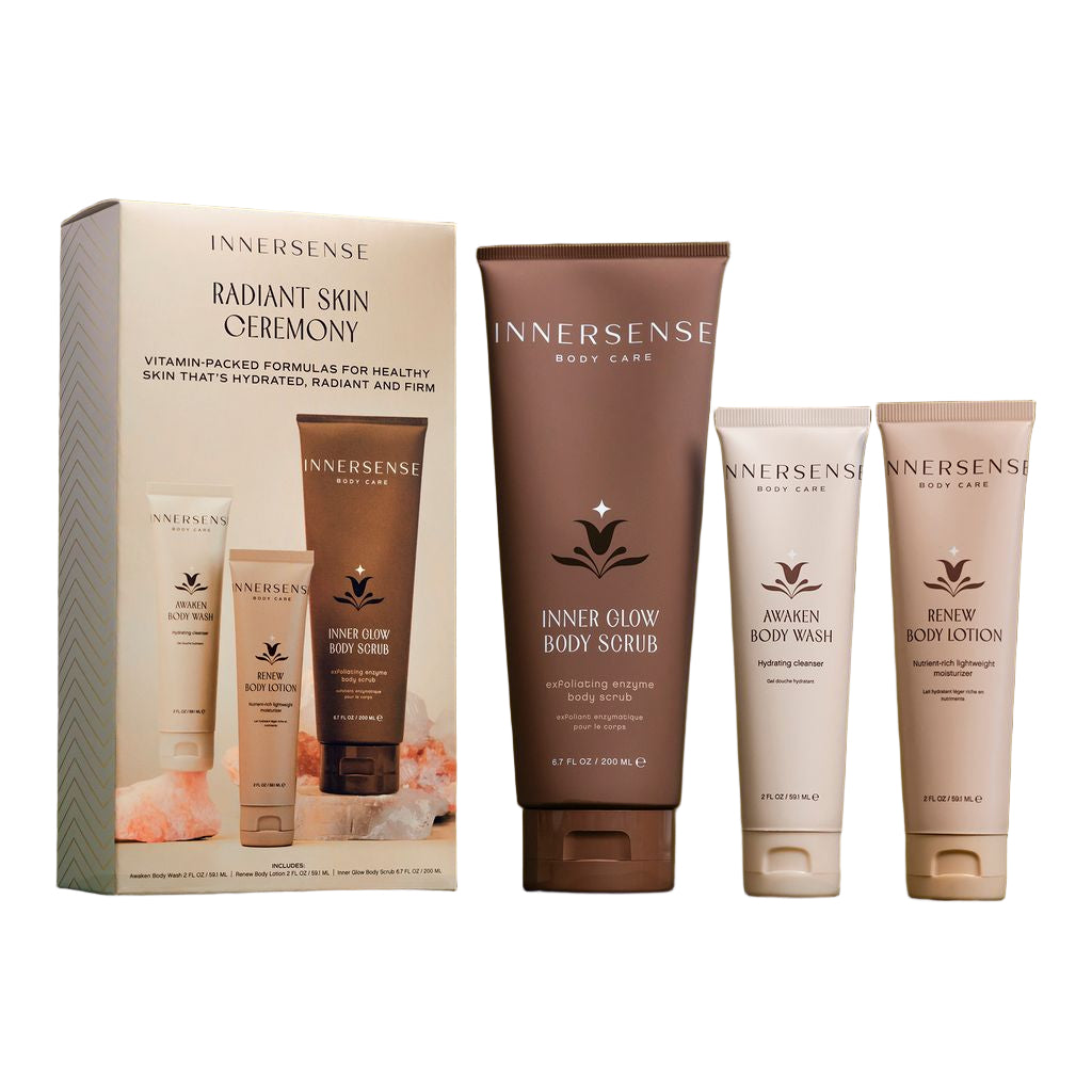 Innersense body care products including scrub, wash, and lotion with packaging on a white background