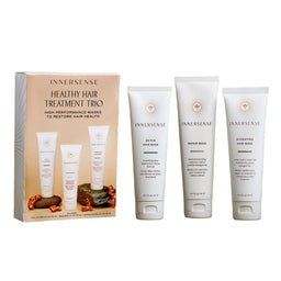 INNERSENSE Healthy Hair Treatment Trio on a green background