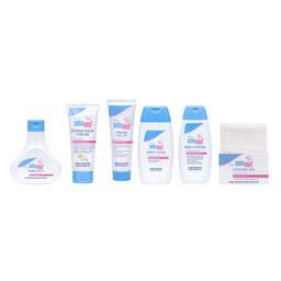 Set of baby care products including bottles, creams, and a box on a white background