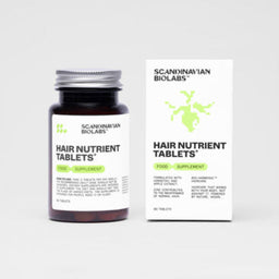 A dark amber bottle and matching white box of Scanynavian Biolabs Hair Nutrient Tablets, shown on a clean light gray background.