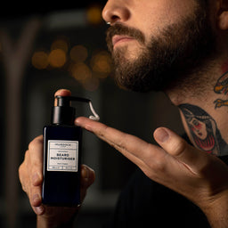 a man applying Murdock London Beard Moisturiser to his hand